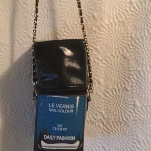 Nail polish shaped purse